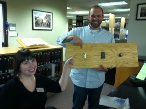 Librarians Williams and Brannon point out the selected laptop anchor