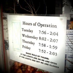 Hours of Operation sign